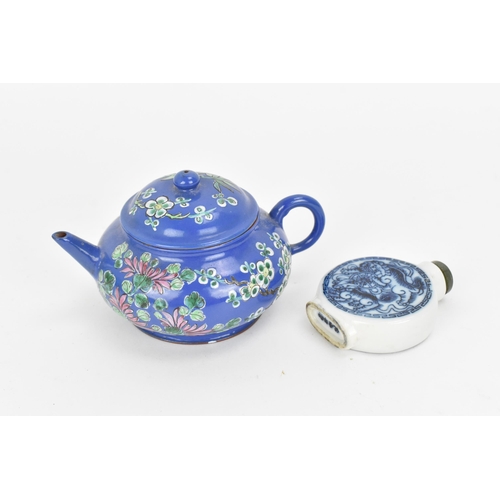 80 - A Chinese enamelled Yixing (zisha) miniature teapot, 20th century, of squat form with blue ground de... 