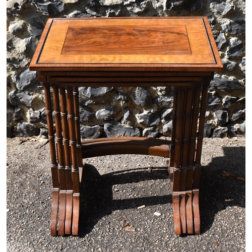 144 - A Victorian quartetto nest of mahogany, satinwood and rosewood tables, with ebony beading, the top o... 