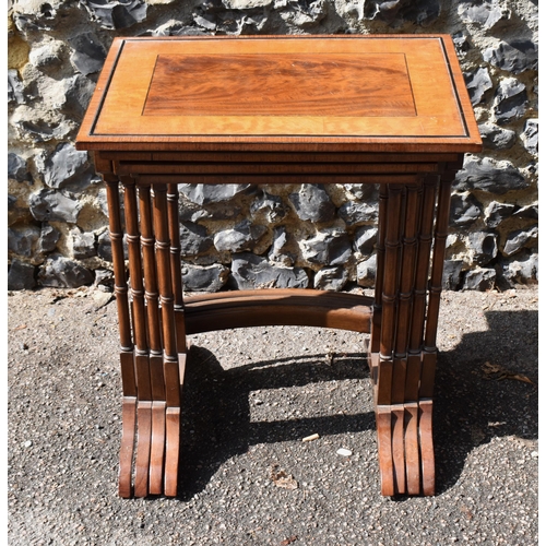 144 - A Victorian quartetto nest of mahogany, satinwood and rosewood tables, with ebony beading, the top o... 