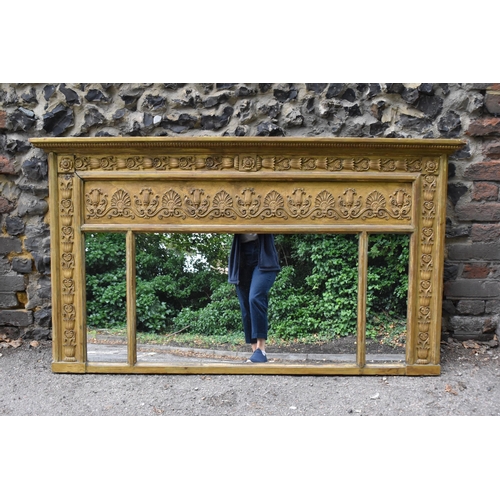 147 - A Regency style giltwood overmantle mirror, late 19th century, the tripartite plate framed with moul... 