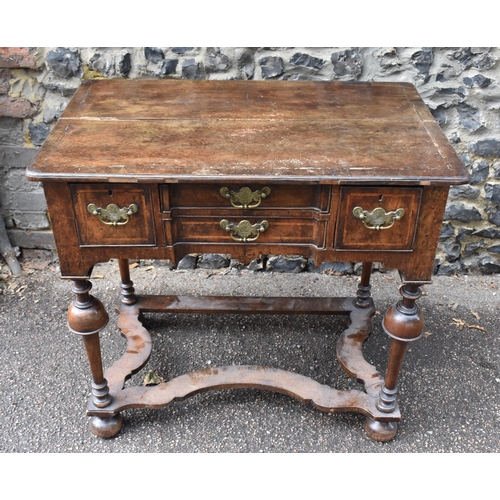 201 - A William and Mary style walnut dressing table, early 18th century, with feather-banded rectangular ... 