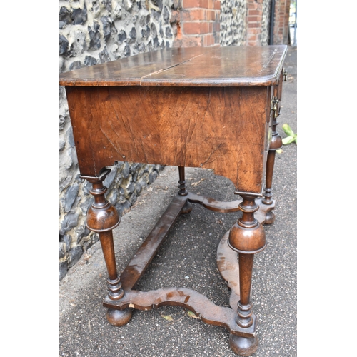 201 - A William and Mary style walnut dressing table, early 18th century, with feather-banded rectangular ... 