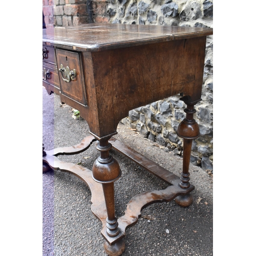 201 - A William and Mary style walnut dressing table, early 18th century, with feather-banded rectangular ... 