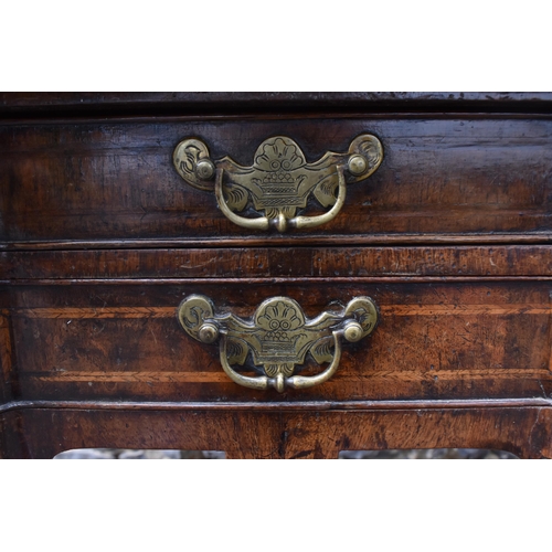 201 - A William and Mary style walnut dressing table, early 18th century, with feather-banded rectangular ... 