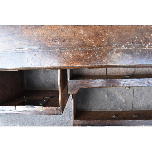 201 - A William and Mary style walnut dressing table, early 18th century, with feather-banded rectangular ... 