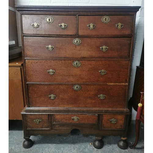 202 - A Georgian oak chest on stand, late 18th century, with moulded cornice above two short over three gr... 