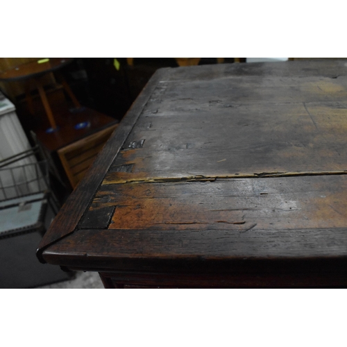 202 - A Georgian oak chest on stand, late 18th century, with moulded cornice above two short over three gr... 