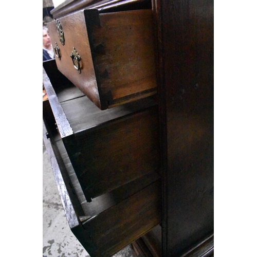 202 - A Georgian oak chest on stand, late 18th century, with moulded cornice above two short over three gr... 