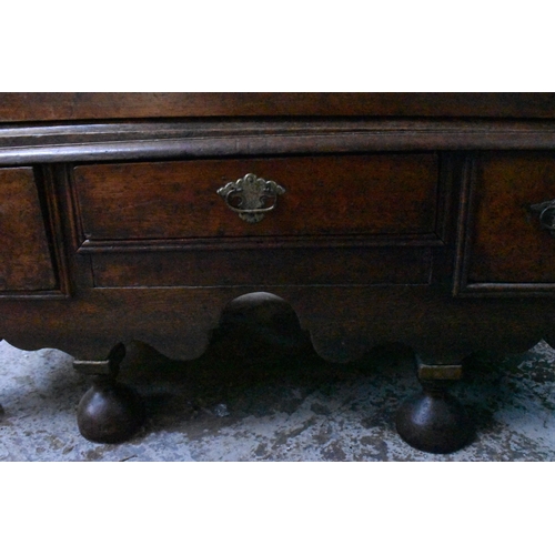 202 - A Georgian oak chest on stand, late 18th century, with moulded cornice above two short over three gr... 