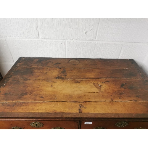 202 - A Georgian oak chest on stand, late 18th century, with moulded cornice above two short over three gr... 