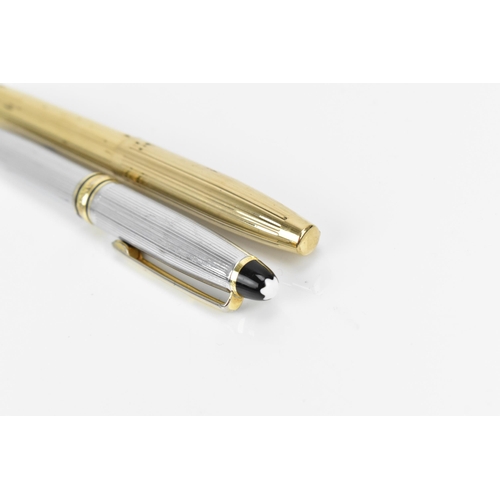 74 - A Sheaffer gold-plated fountain pen, with 14ct yellow gold nib, stamped 585, of tapered form with pa... 