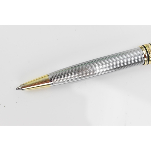 74 - A Sheaffer gold-plated fountain pen, with 14ct yellow gold nib, stamped 585, of tapered form with pa... 