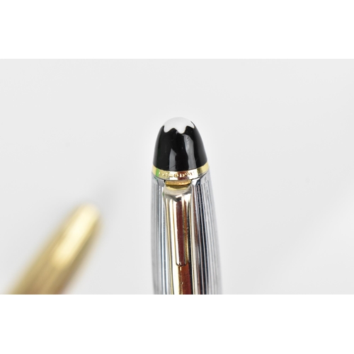 74 - A Sheaffer gold-plated fountain pen, with 14ct yellow gold nib, stamped 585, of tapered form with pa... 