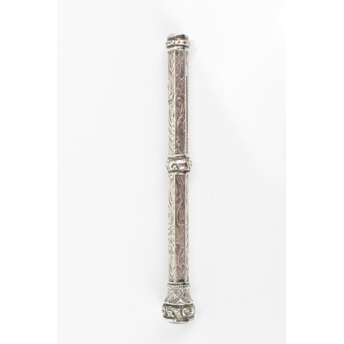 76 - A Victorian white metal retractable pencil, of tapered faceted form will pull up ring, the finial se... 