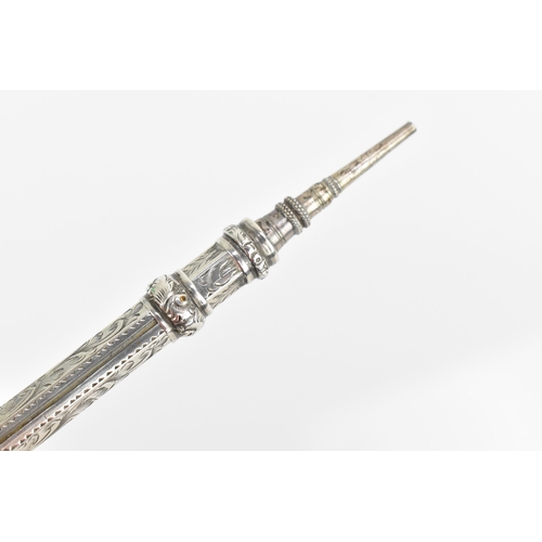 76 - A Victorian white metal retractable pencil, of tapered faceted form will pull up ring, the finial se... 