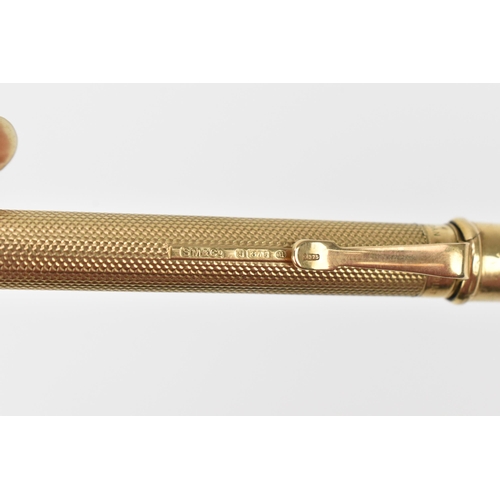 80 - A 9ct yellow gold everpoint pencil by Sampson Mordan & co, hallmarked to the textured body and clip,... 