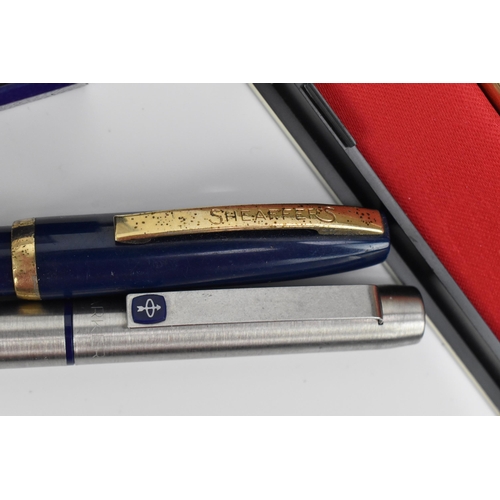 85 - A Waterman 'hémisphère' fountain pen, in stainless steel with gilt ring and clip, in original box an... 