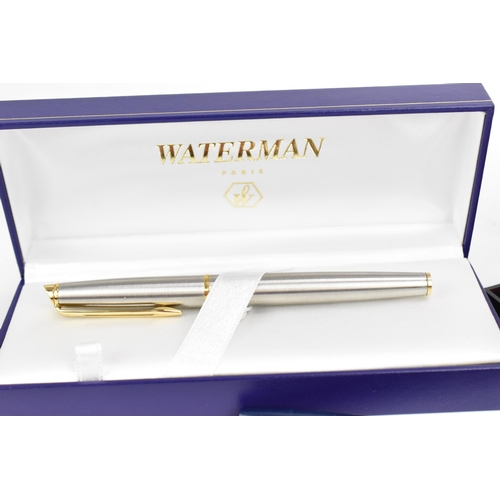 85 - A Waterman 'hémisphère' fountain pen, in stainless steel with gilt ring and clip, in original box an... 