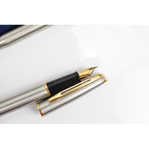 85 - A Waterman 'hémisphère' fountain pen, in stainless steel with gilt ring and clip, in original box an... 