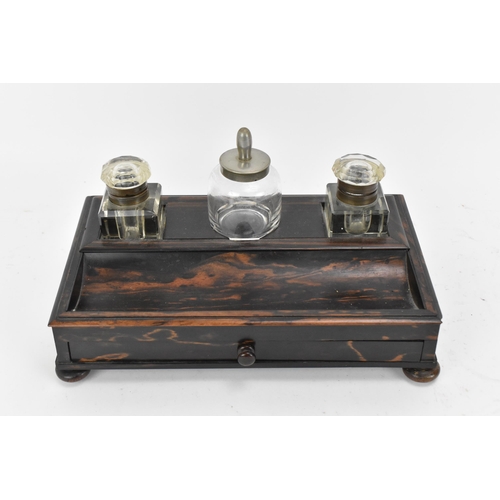 86 - A mid-century coromandel double inkstand, with two cut glass inkwells either side of an ink pot, wit... 