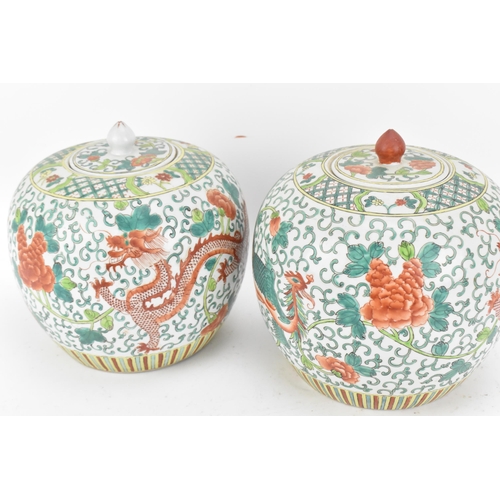 104 - A pair of Chinese Famille Verte porcelain ginger jars, early 20th century, of ovoid form with dragon... 