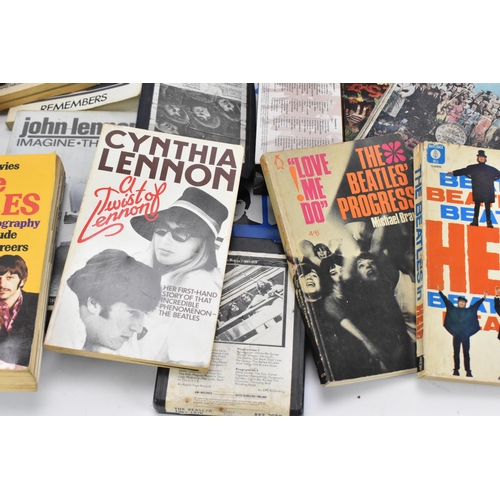 190 - A collection of 'The Beatles' collector's ephemera, to include various books, tapes, VHS, calendars,... 