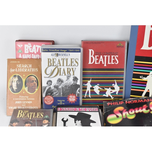 190 - A collection of 'The Beatles' collector's ephemera, to include various books, tapes, VHS, calendars,... 