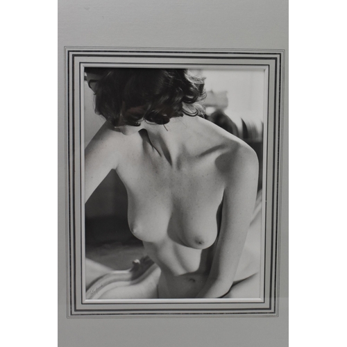 200 - Peter Fink (1907-1984) American
 Female nude black and white photograph, signed 'Peter Fink' lower l... 