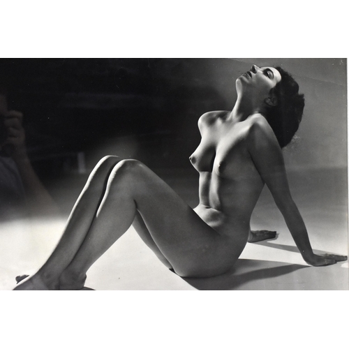 200 - Peter Fink (1907-1984) American
 Female nude black and white photograph, signed 'Peter Fink' lower l... 