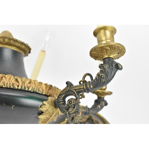 208 - An Empire style toleware and gilt-metal chandelier, of plain design holding six arms with sleeves, h... 