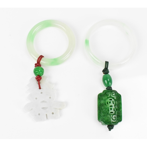 92 - Two Chinese modern jade pendants, one with white jade character hanging on the hoop, the other with ... 