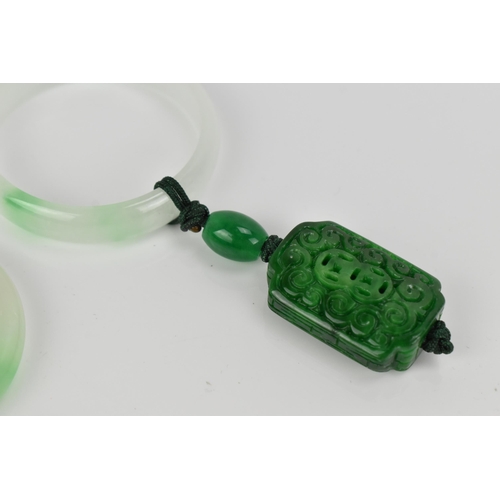 92 - Two Chinese modern jade pendants, one with white jade character hanging on the hoop, the other with ... 