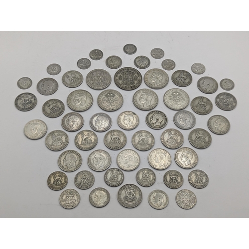 18 - A collection of British 1920 -1946 coinage to include Half Crown, Florins/Two Shillings, Shillings, ... 