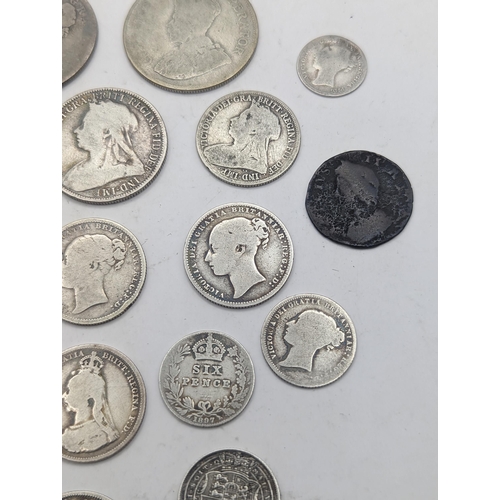 19 - A collection of Georgian and Victorian British coinage to include a George III 1819 Sixpence, mixed ... 