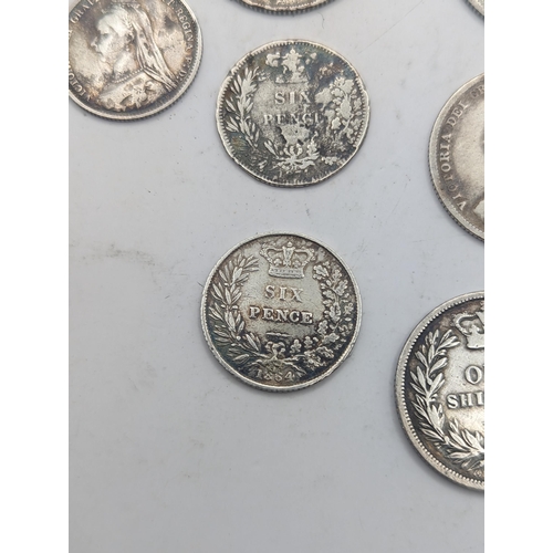 19 - A collection of Georgian and Victorian British coinage to include a George III 1819 Sixpence, mixed ... 