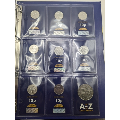 23 - An A-Z of Great Britain 10p collection, comprising of 16 10 pence along with the A-Z commemorative h... 