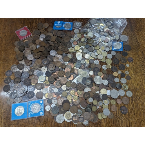 24 - A quantity of British and world coinage to include George III halfpenny, Cartwheel penny A/F, Leopol... 