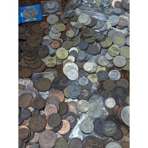 24 - A quantity of British and world coinage to include George III halfpenny, Cartwheel penny A/F, Leopol... 