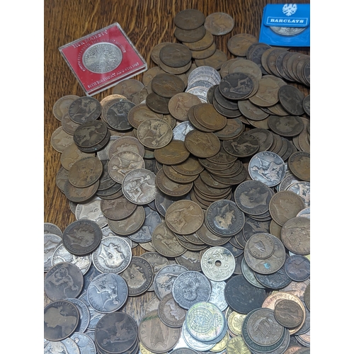 24 - A quantity of British and world coinage to include George III halfpenny, Cartwheel penny A/F, Leopol... 