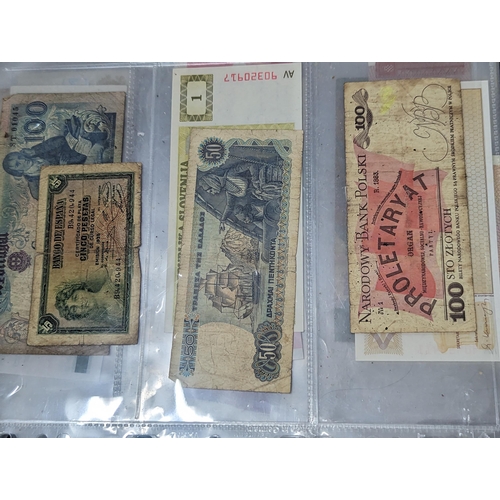 25 - A quantity of 20th century and later world banknotes to include 2006 HSBC 100 Hong Kong, Venezuela, ... 