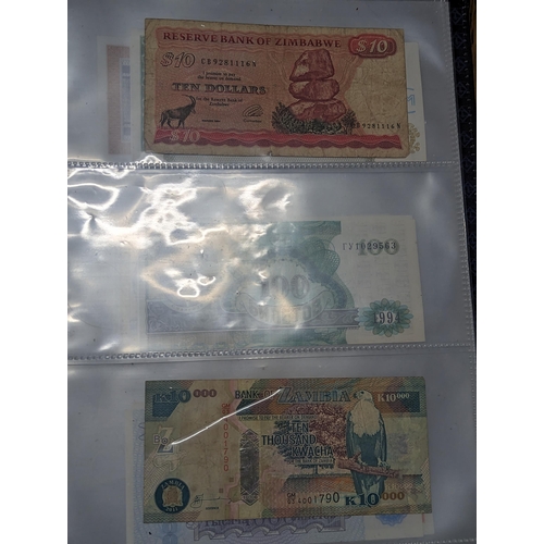 25 - A quantity of 20th century and later world banknotes to include 2006 HSBC 100 Hong Kong, Venezuela, ... 