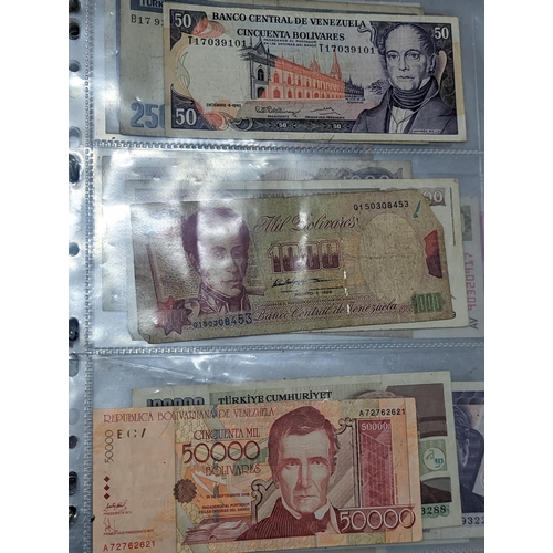 25 - A quantity of 20th century and later world banknotes to include 2006 HSBC 100 Hong Kong, Venezuela, ... 