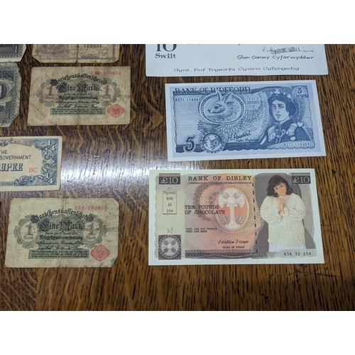 27 - Mixed banknotes and others to include early 20th century German examples, later Japanese Government,... 