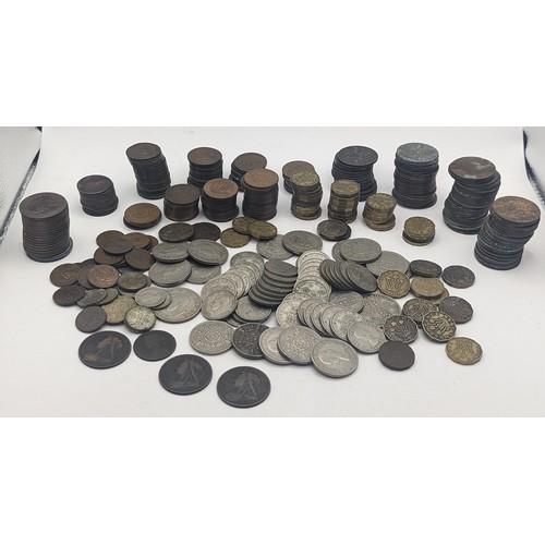 20 - A quantity of pre decimal British coinage to include Victorian and later pennies, George VI two Shil... 