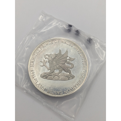 38 - Royal Mint 1969 Prince of Wales Investiture Silver Medal, 110g in presentation box
Location: CAB1