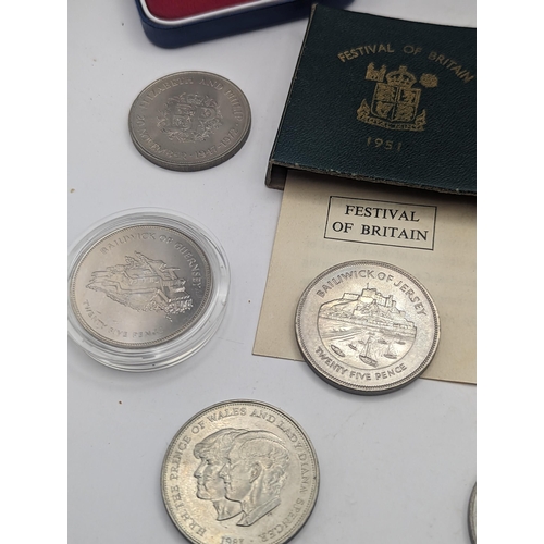 39 - A mixed collection of coins to include a silver Proof Silver Jubilee and  Charles and Diana Crowns, ... 