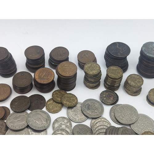 20 - A quantity of pre decimal British coinage to include Victorian and later pennies, George VI two Shil... 