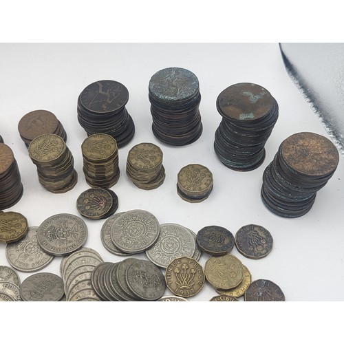 20 - A quantity of pre decimal British coinage to include Victorian and later pennies, George VI two Shil... 