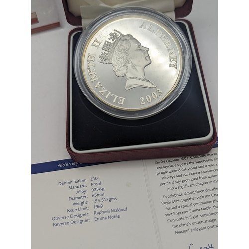 6 - A group of three Concorde commemorative coins to include the 502 silver proof 2003 Alderney £10, the... 