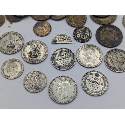 63 - A mixed British and world coins to include George V Shillings, mixed pennies and later examples, Fre... 